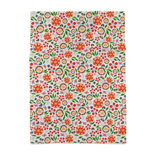 Image of a cotton tea towel featuring colorful stylized flowers in orange, green, blue and pink against a white background
