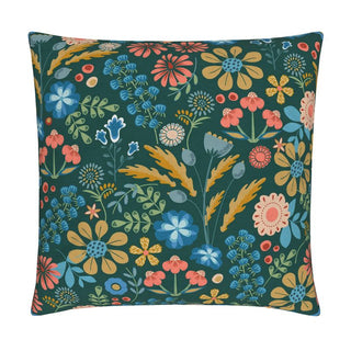 Image of a cotton linen blend throw pillow cover featuring colorful stylized flowers in blue, gold and coral against a dark green background