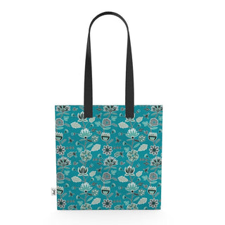 canvas tote with blue and gray flowers on a blue background