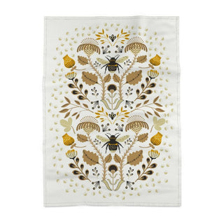 Decorative tea towel with floral and bee pattern. sold online at jean c studio.