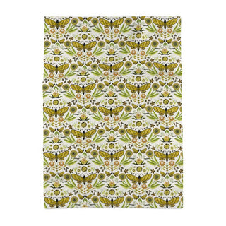 Floral and butterfly patterned towel. sold online at jean c studio.