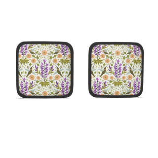 Two potholders with illustration of hummingbirds and flowers. Sold online by JeanC Studio