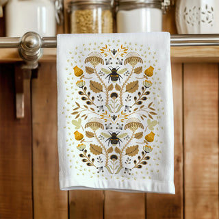 Decorative tea towel with floral and bee pattern. sold online at jean c studio.