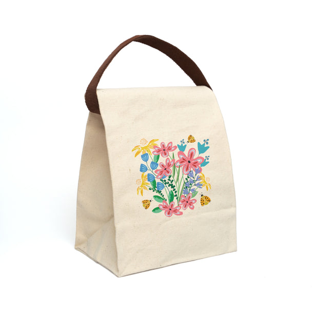 Beige lunch bag with strap with colorful floral design of flowers and ladybugs