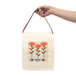 image of canvas lunch bag with illustration of abstract indian paintbrush flowers and bees