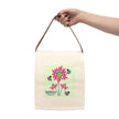 image of canvas lunch bag with illustration of bees and red coneflowers