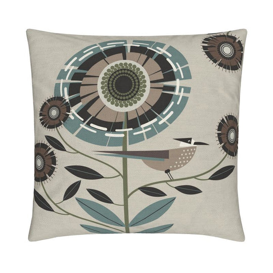 image of a throw pillow. the pillow has a light tan background and one large stylized teal and tan flower. There is also a tan and teal bird sitting on a stem. Smaller brown and dark brown flowers surround it. 