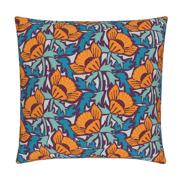 Image of pillow cover featuring bold large poppies in orange, surrounded by blue green leaves, on a dark background.