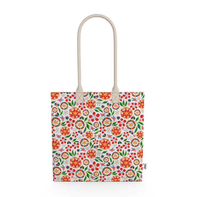 Image of tote bag with orange and red flowers, green leaves, ladybugs and butterflies against a white background