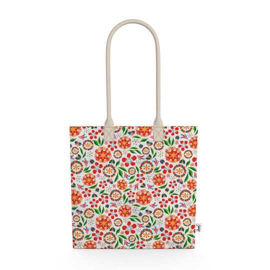 Image of tote bag with orange and red flowers, green leaves, ladybugs and butterflies against a white background