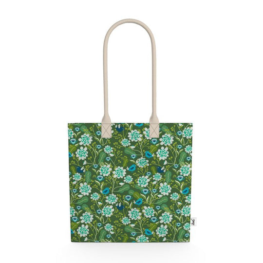 Image of tote bag with hand drawn flowers in pale blue. Also seen are blue birds and leaves.
