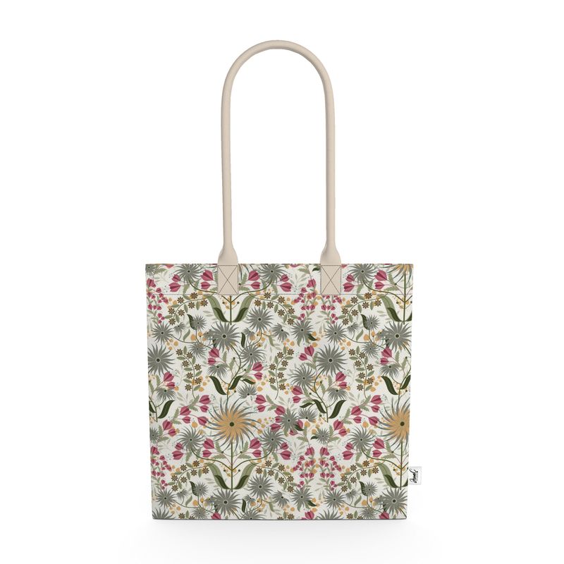 image of organic cotton tote bag with abstract grey, gold and pink flowers and leaves on a pale green background