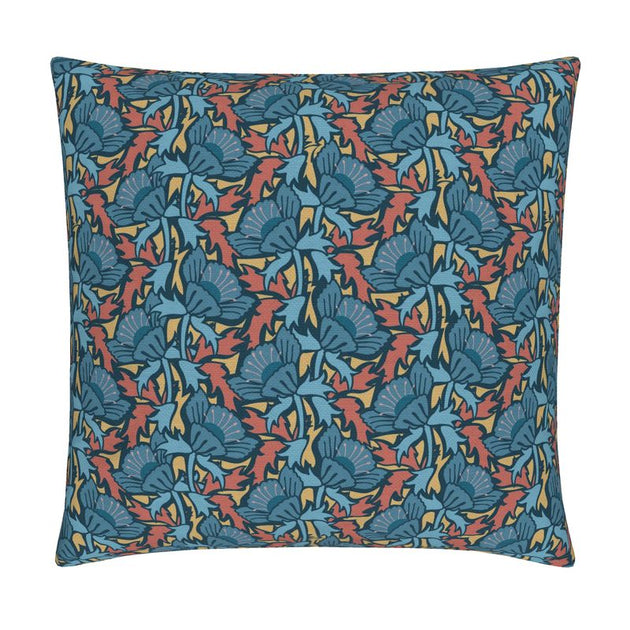 Image of pillow cover with bold blue blossoms and blue and rust colored leaves on a gold background.