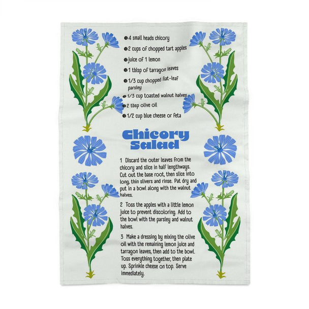Image of a tea towel with blue chicory flowers and a recipe for chicory salad