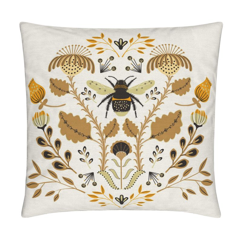 image of pillow with big bumblebee and flowers on it
