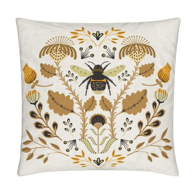 image of pillow with big bumblebee and flowers on it