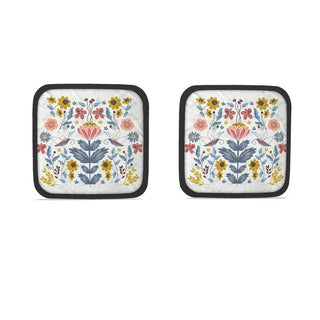 flowers and moths illustration on two pot holders. sold online at jean c studio.