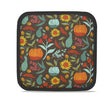 image of fall themed pot holder with pumpkins and sunflowers