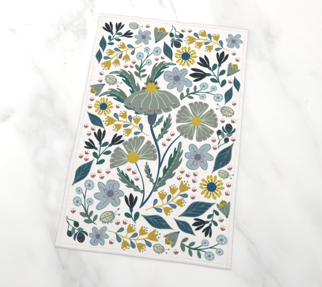floral pattern with ladybugs on tea towel