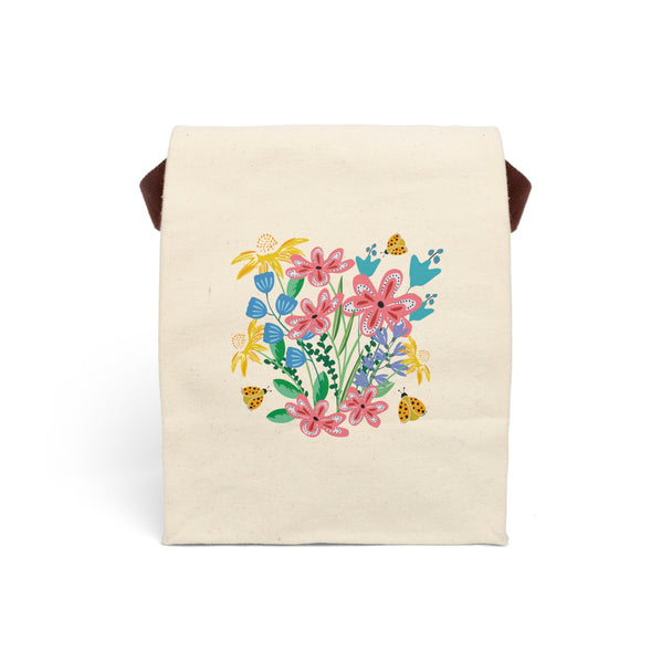 Beige lunch bag with colorful floral design of flowers and ladybugs