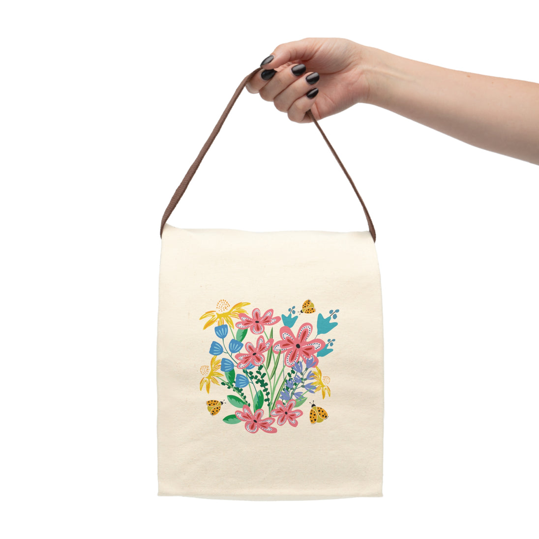 Beige lunch bag with colorful floral design of flowers and ladybugs