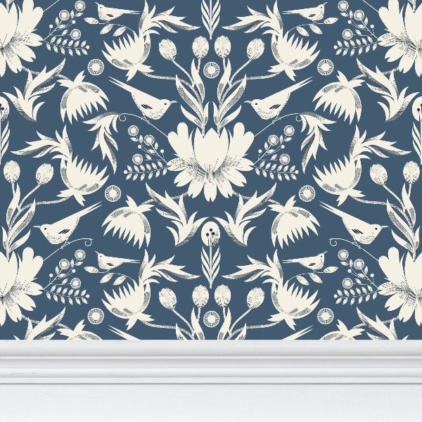 Image of wallpaper closeup featuring stylized large white flowers and birds against a blue gray background